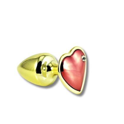 Imagem de Plug em metal Dourado Com Pedra De Coração Vermelha